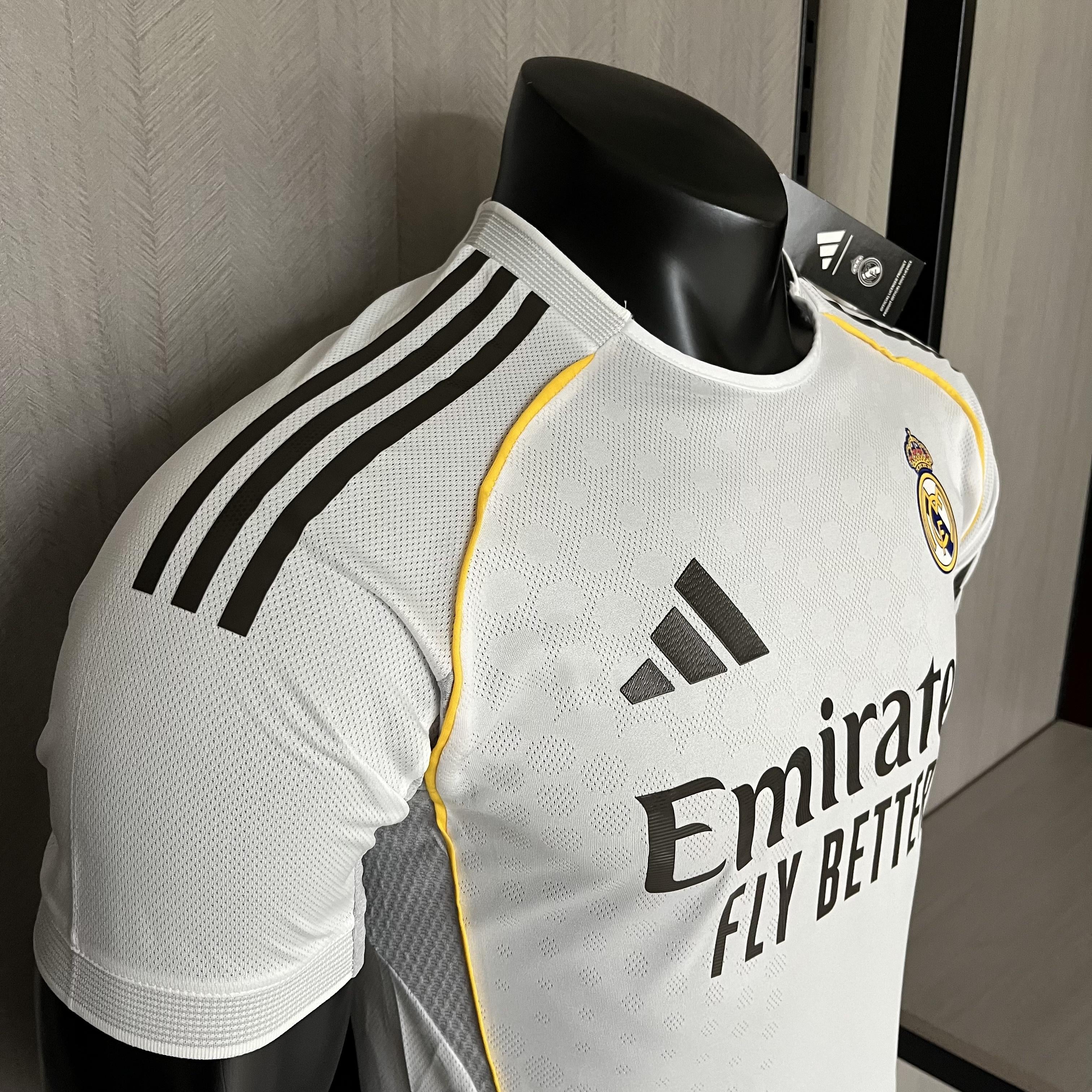 Camisa Real Madrid Titular 2025/26 - Versão Jogador Branco e Dourado